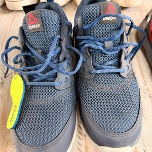 Reebok XRT brand with alloy toe caps. Navy Blue Sneakers with Lime Green Insoles